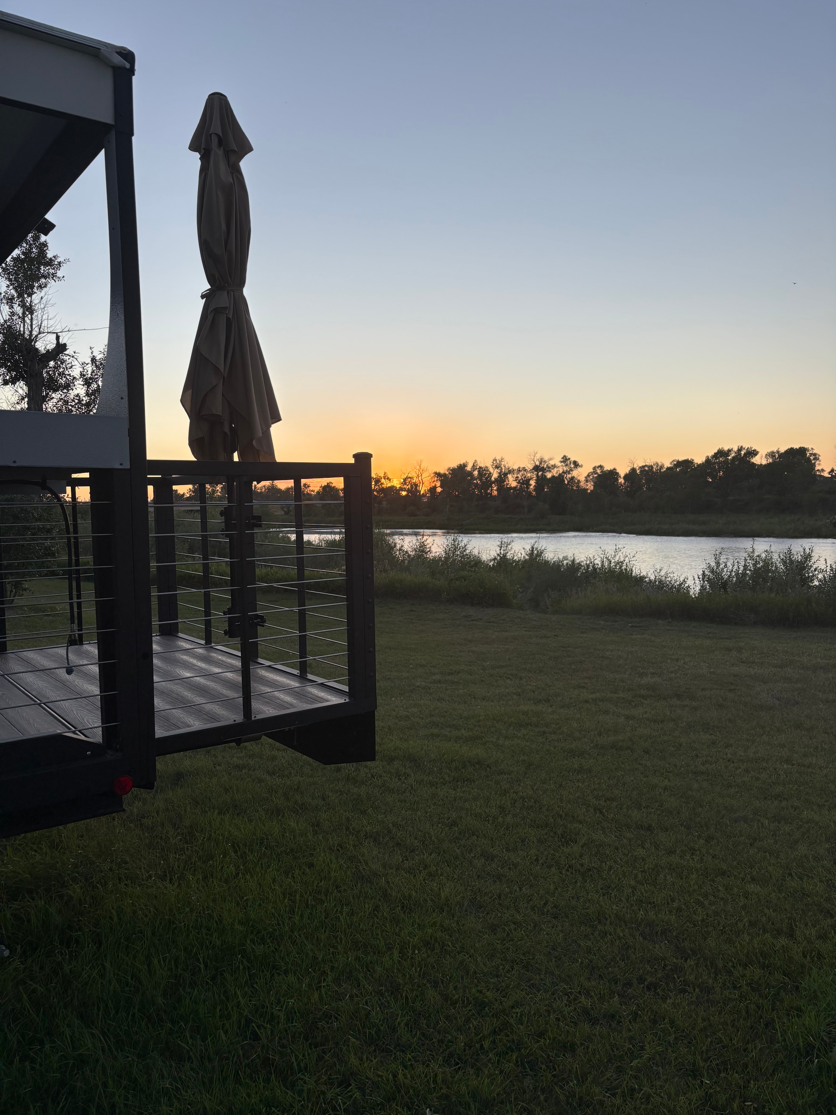 Riverfront RV site on the Oldman River at Rivers Edge Campground